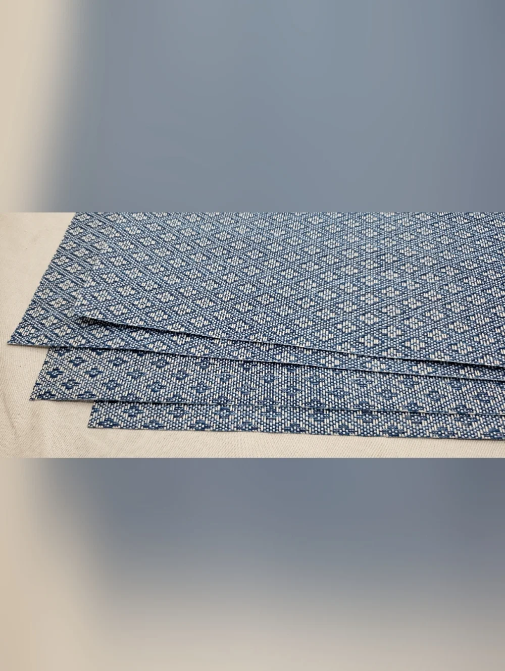 Four Blue And White IKEA Placemats